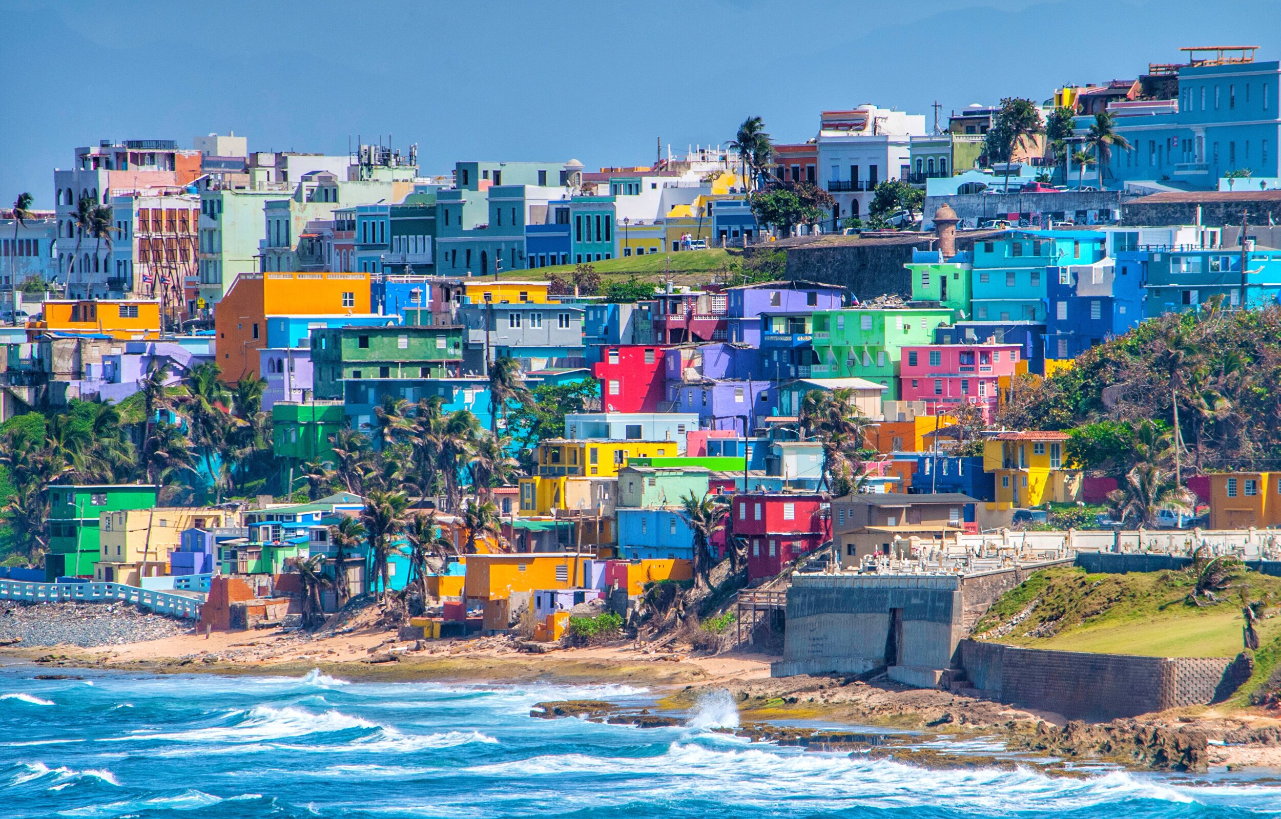 colorful-houses-line-the-hillside-over-looking-the-ocean-on-the-island-of-san-juan-puerto-rico_t20_koA8QP.jpg