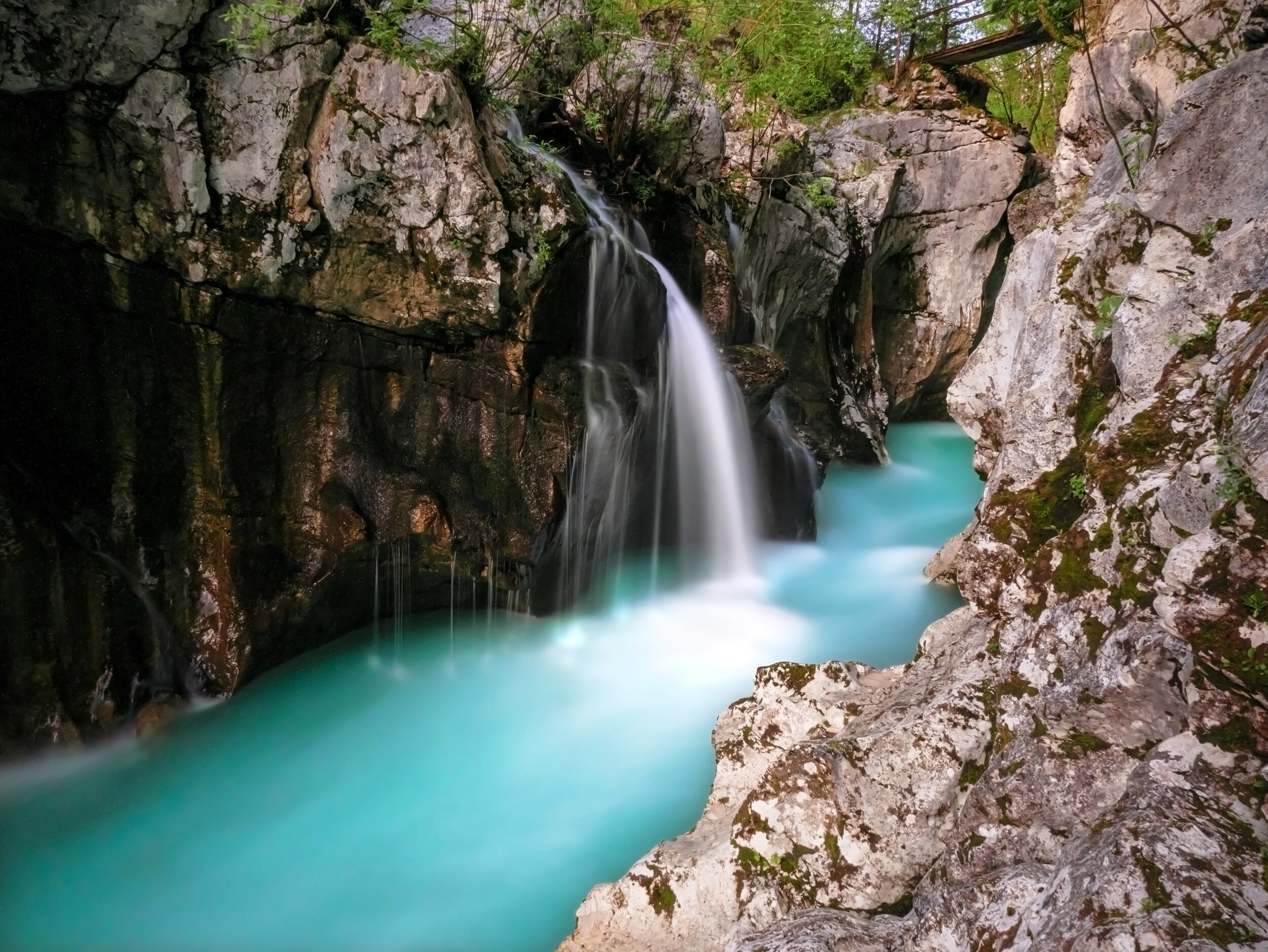 nominated-a-long-exposure-photo-of-a-gorgeous-emerald-green-river-and-its-gorge-and-a-small-waterfall_t20_GgoAQR.jpg